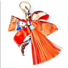 Load image into Gallery viewer, Faux Leather Tassel w/scarf charm

