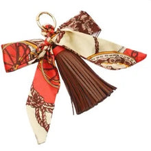 Load image into Gallery viewer, Faux Leather Tassel w/scarf charm
