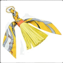 Load image into Gallery viewer, Faux Leather Tassel w/scarf charm
